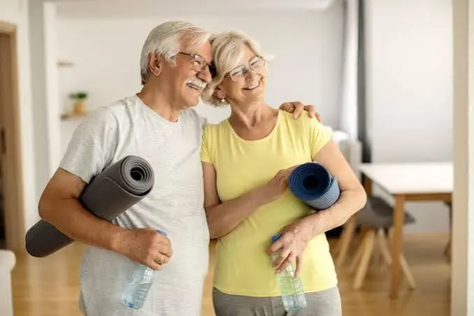 Woman doing a light strength exercise at home